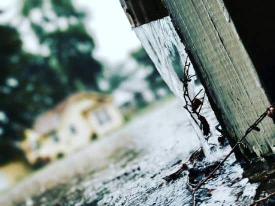 water pouring from home's spout